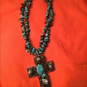 Turquoise color necklace with cross
